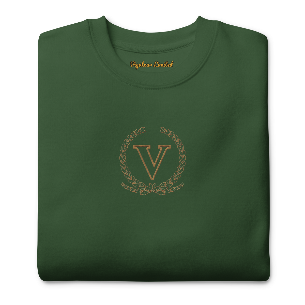 Core V Sweatshirt in Forest Green, folded, close-up of the embroidered V crest. Vigatour Mark I