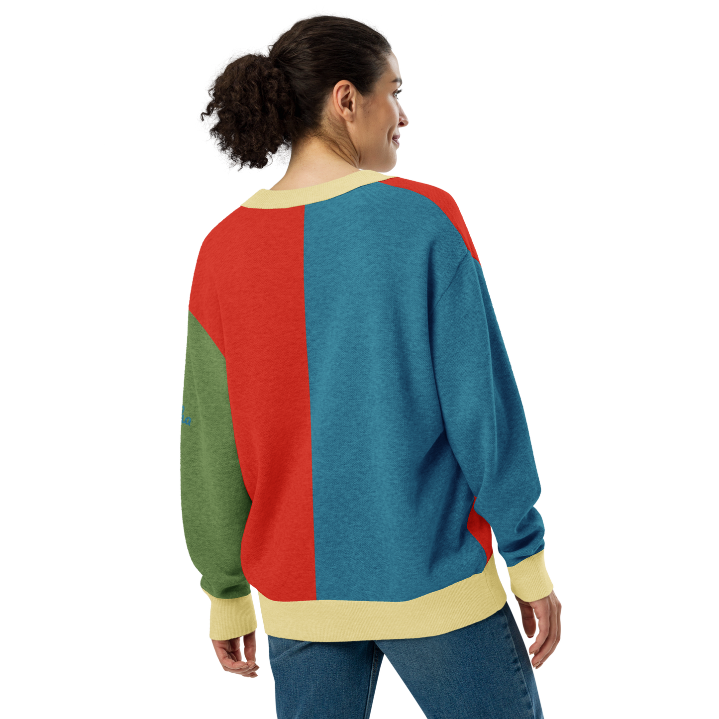 Person wearing a colorful sweater with a white background