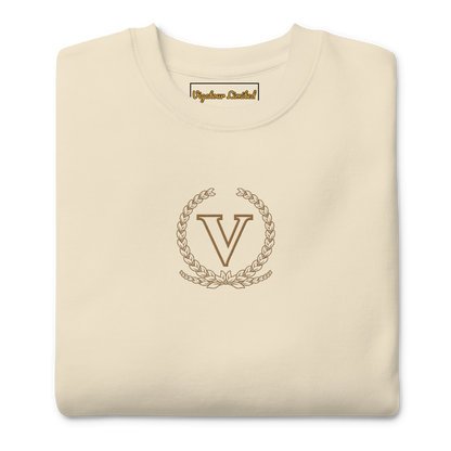 Core V Sweatshirt in Bone, folded, close-up of the embroidered V crest. Vigatour Mark I