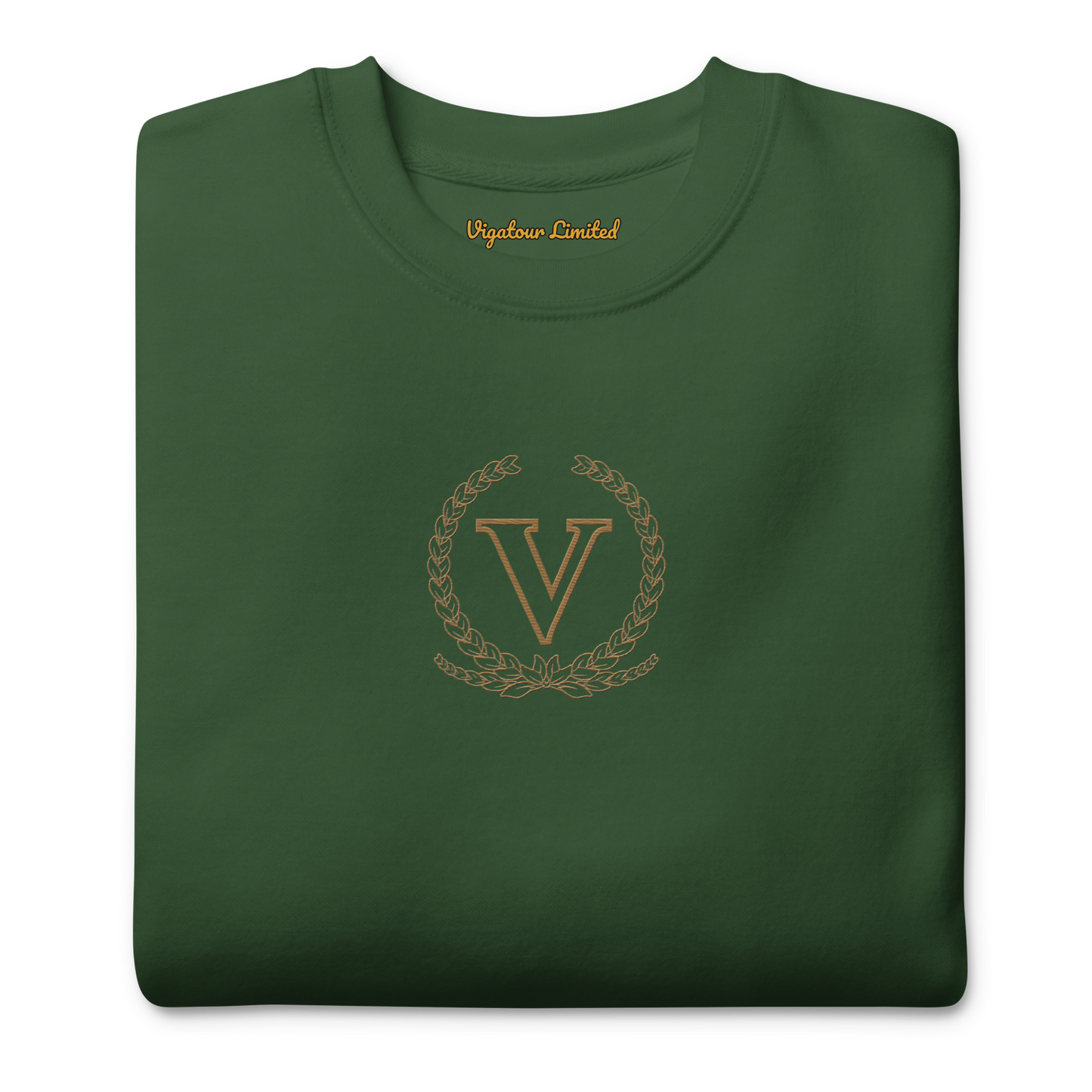 Folded green sweatshirt with a gold emblem and 'V' on a white background