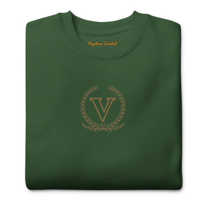 Core V Sweatshirt in Forest Green, folded, close-up of the embroidered V crest. Vigatour Mark I
