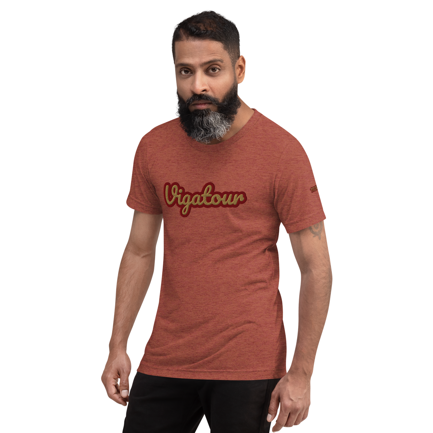 Man wearing a red t-shirt with 'Vigatour' text on a white background