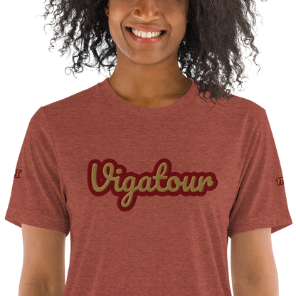 Woman wearing La Vee in Clay Triblend, close-up of the gold and burgundy embroidered script. Vigatour Mark I