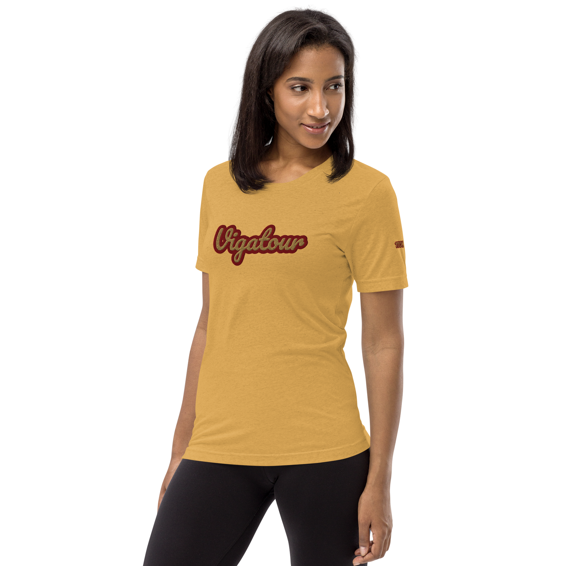 Woman wearing a mustard yellow t-shirt with red text on a white background
