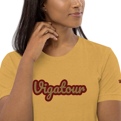 La Vee in Mustard Triblend, close-up of the gold and burgundy embroidered script. Vigatour Mark I