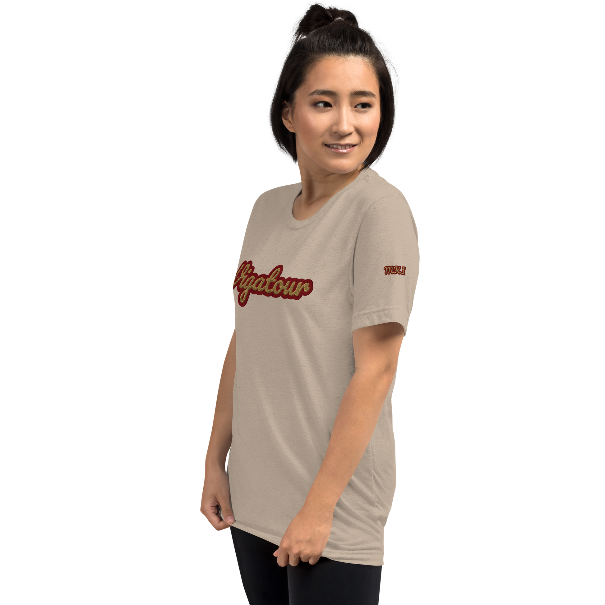 Woman wearing a beige t-shirt with red text on a white background